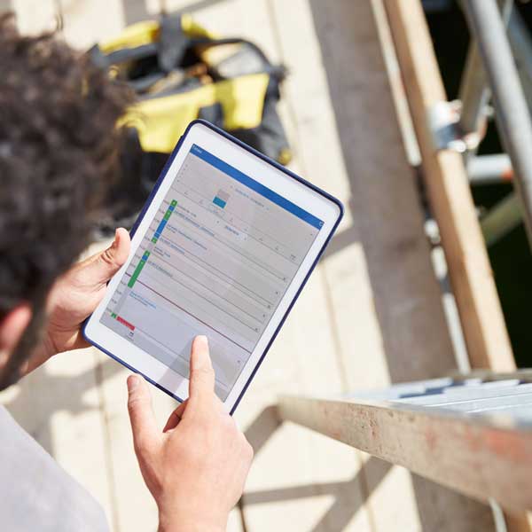 A technician uses Simpro mobile to manage his service jobs in the field.